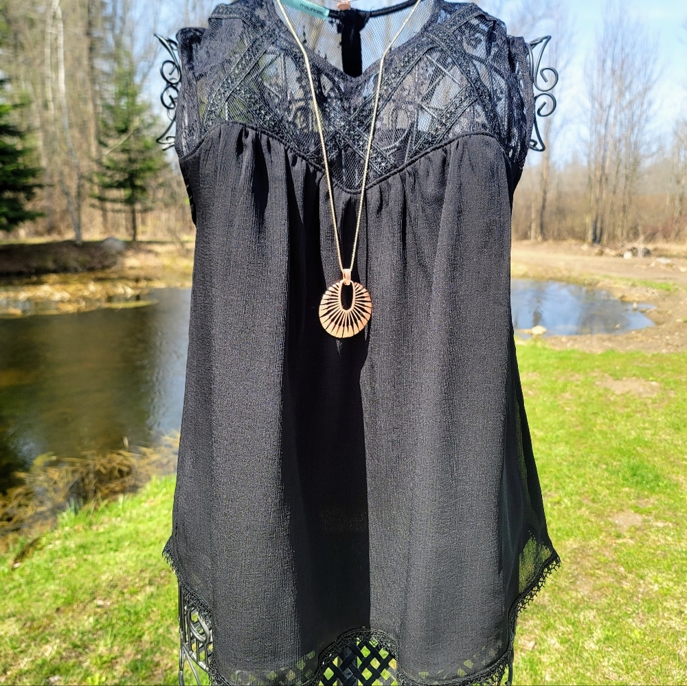 Maurices baby doll black top with lace.  Size Medium.